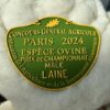 Médaille du Concours Général Agricole 2024 à Paris, récompensant la laine de mouton mâle.